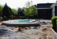 Pour standard concrete decking around fiberglass pool